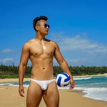 Muži Svetlé jednofarebné plavky 2020 nové mužov sexy bikiny tesný nízkym pásom pol pack hip plavky hot homosexuáli plávať trenírky nohavičky
